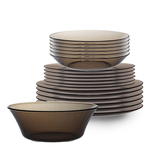 Duralex Lys. 19 Piece Dinnerware set, Six sepia glass dinner plates, six sepia glass dessert plates, six sepia glass soup bowls, and a sepia glass salad bowl. Ensemble de vaisselle de 19 pièces, six assiettes à dîner en verre sepia, six assiettes à dessert en verre sepia, six bols à soupe en verre sepia, et un bol à salade en verre sepia.
