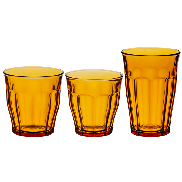 Duralex Le Picardie. Amber Yellow Glass Tumbler in Small, Medium, and Large. Le verre en verre jaune ambré de petite taille, taille moyenne et grande taille.